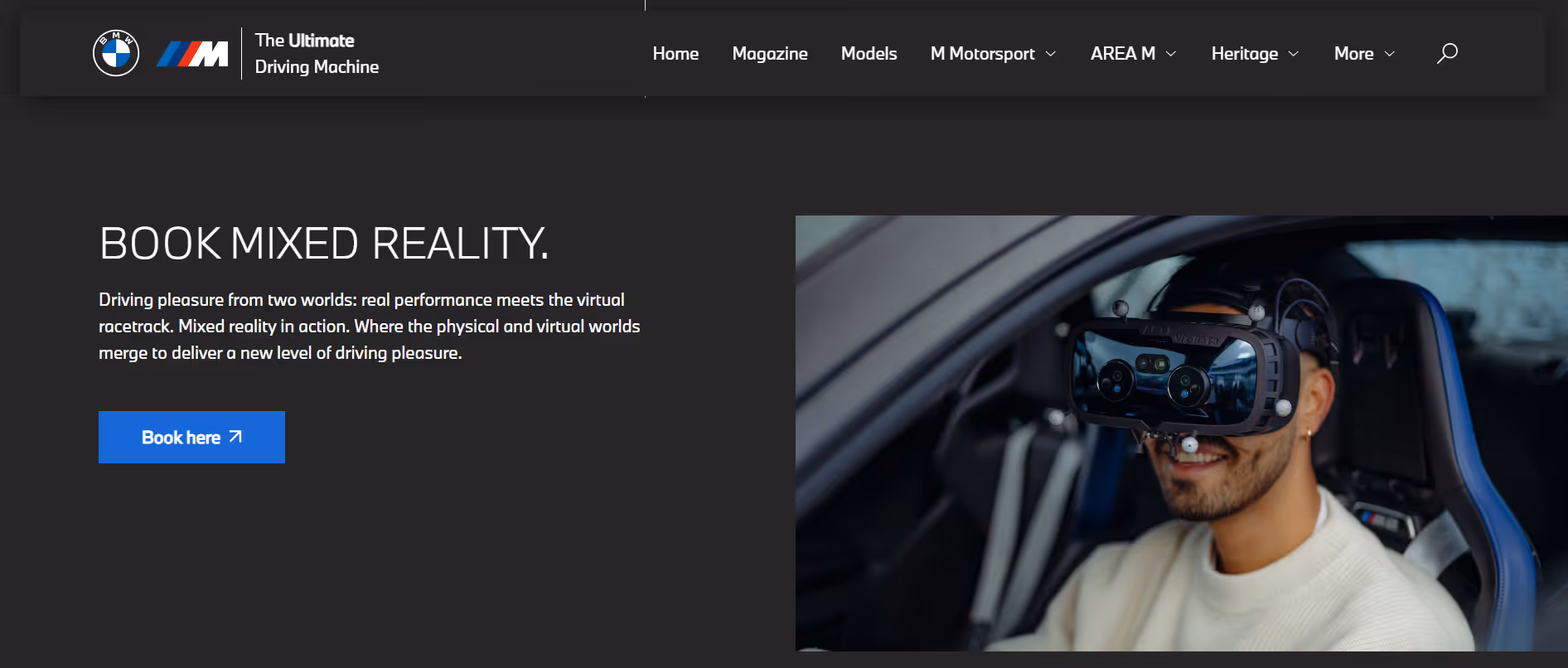 Man smiling inside a car wearing a virtual reality headset for mixed reality driving experience.
